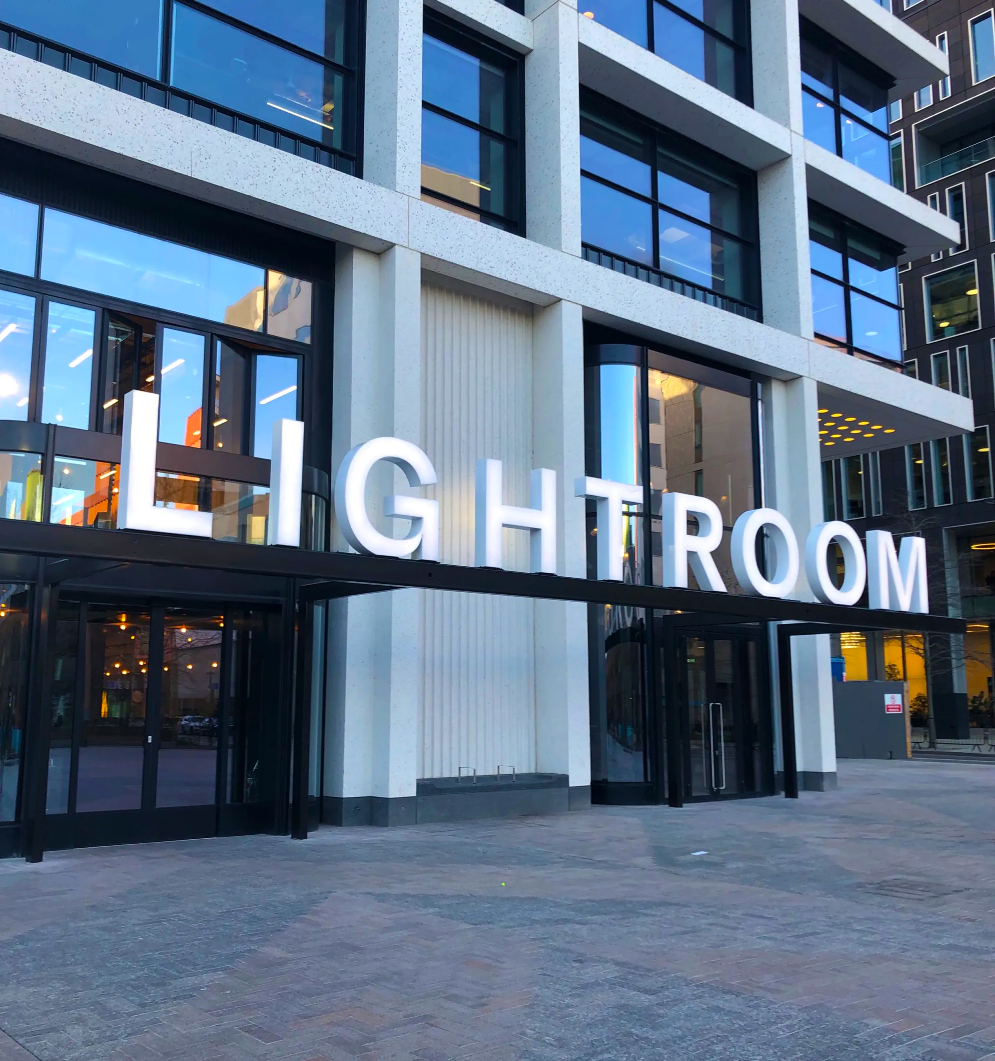 Exterior of a lighting showroom with LIGHTROOM signage